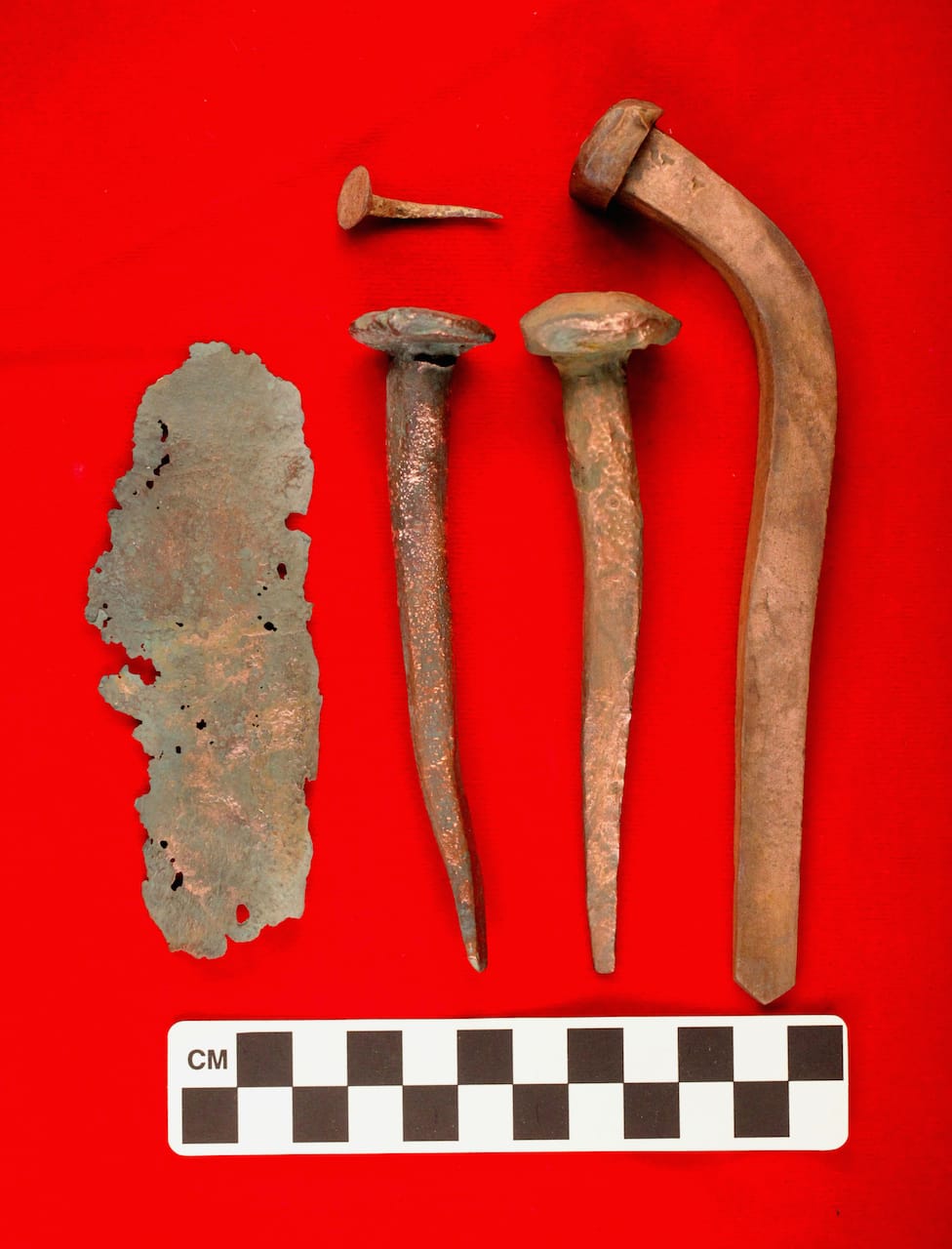 Copper fastenings and copper sheathing that once held the São José slave ship together (courtesy Iziko Museums)