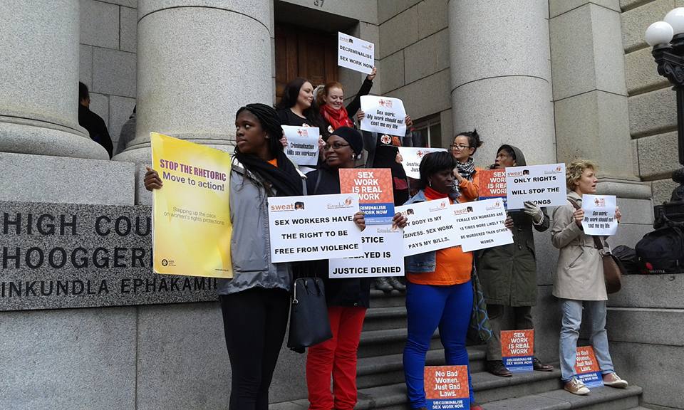 Protesters from SWEAT, as well as Sisonke, Sonke Gender Justice, and other organizations, outside Zwelethu Mthethwa's trial in Cape Town (all photos via SWEAT/Facebook)