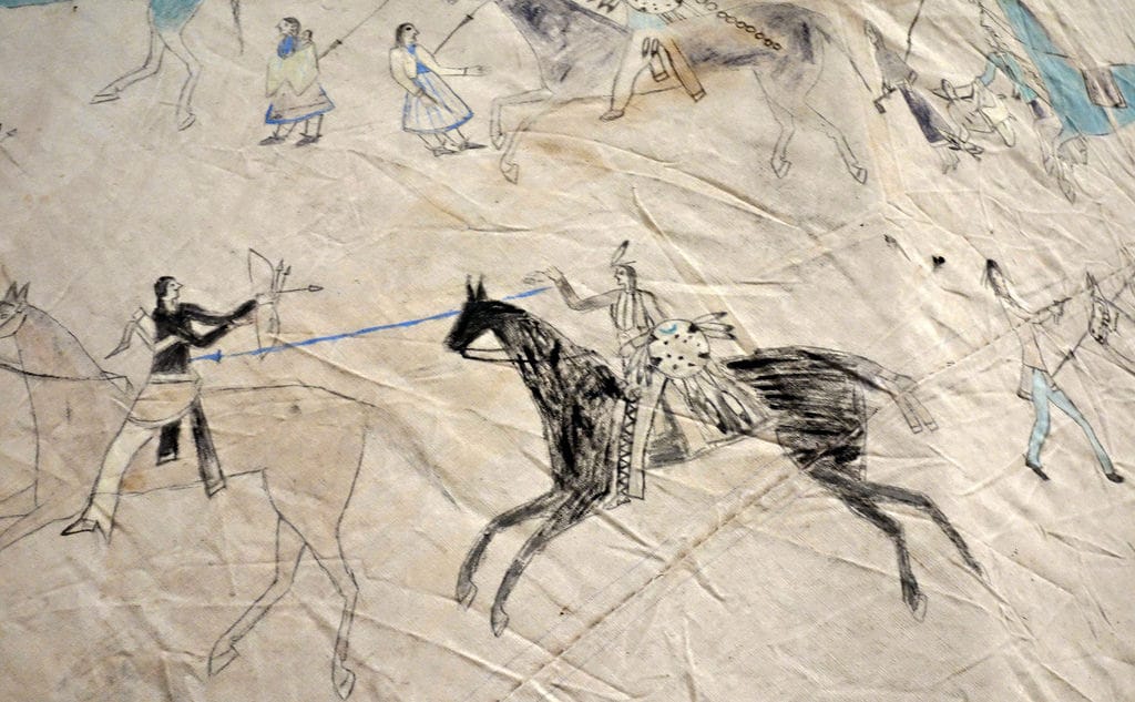 Jṑqī́gácút: Tipi With Battle Pictures