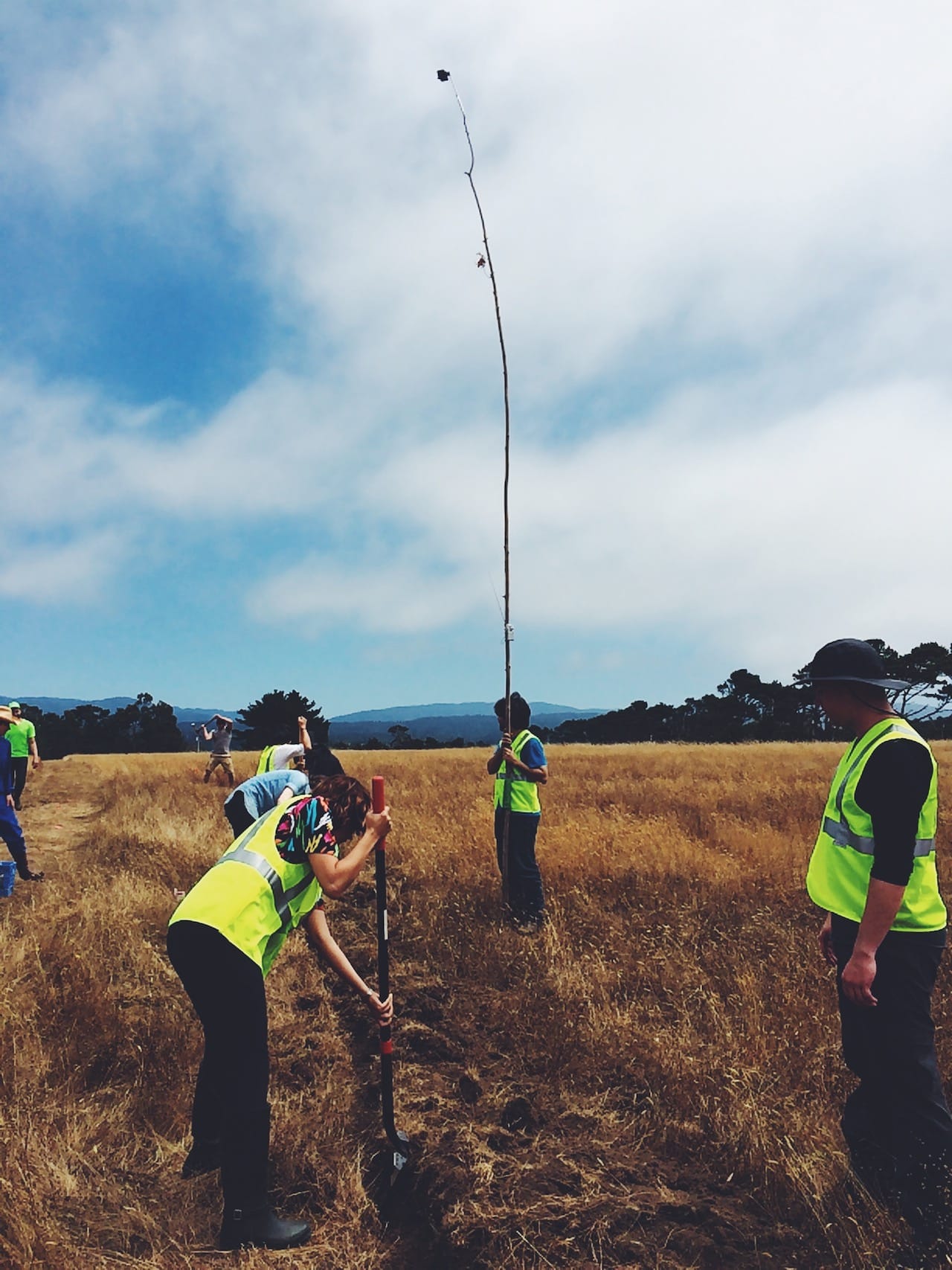 World Wide West participants trenching in 60 acres of land with the extra long selfie stick