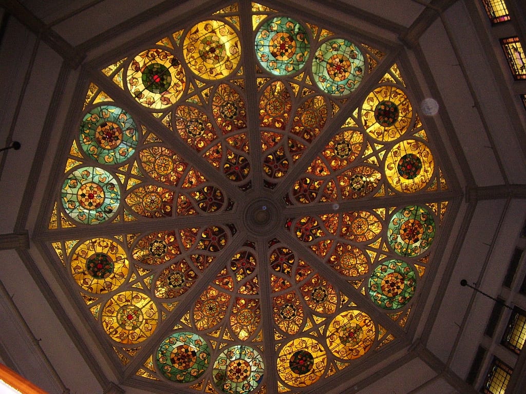 Stained glass ceiling in John's Pizzeria (photo by Mars Infomage, via Flickr)