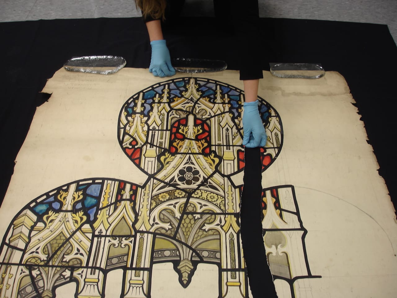 Lining up a torn cartoon for treatment