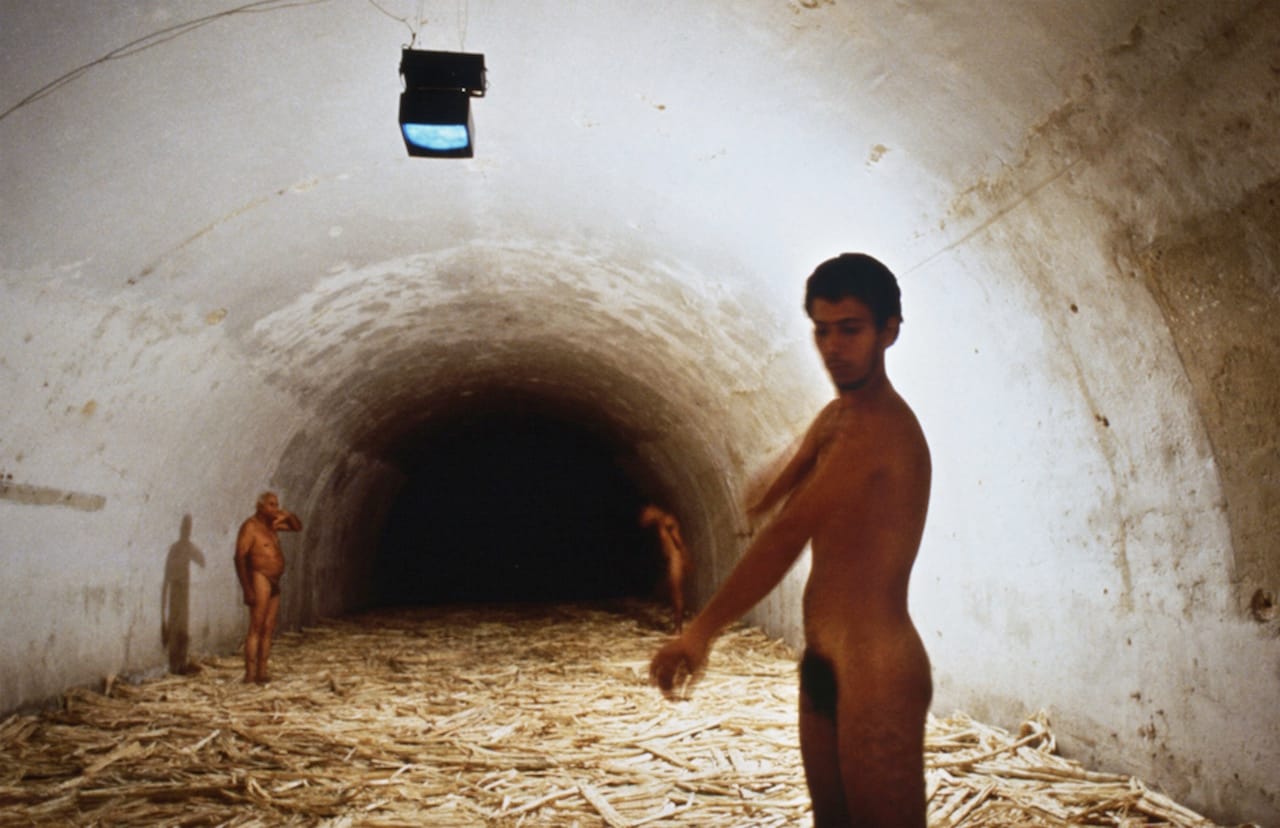 Installation view of Tania Bruguera’s "Untitled (Havana, 2000)" (2000), sugar cane bagasse, video (black and white, silent), and live performance (courtesy of the artist, photo by Casey Stoll)