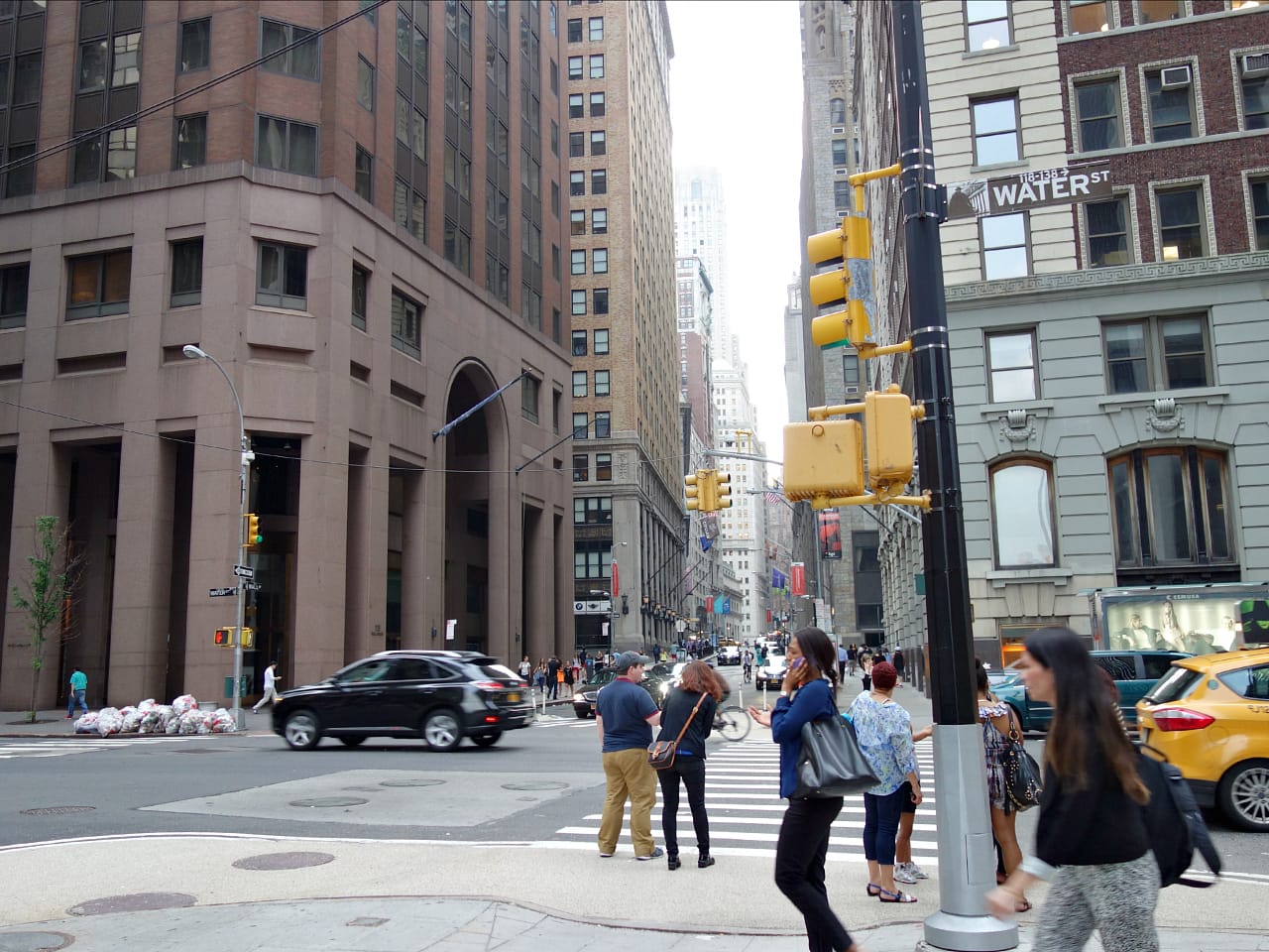 View west on Wall Street from the site of the plaque