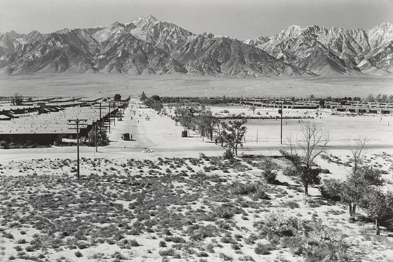 Ansel Adams, "Manzanar, CA, 1943" (1943). Manzanar from guard tower, view west, Sierra Nevada in background. One way Adams got around the WRA restrictions (photograph by Ansel Adams, courtesy the Library of Congress, Prints & Photographs Division [reproduction no. LC-DIG-ppprs-00224])