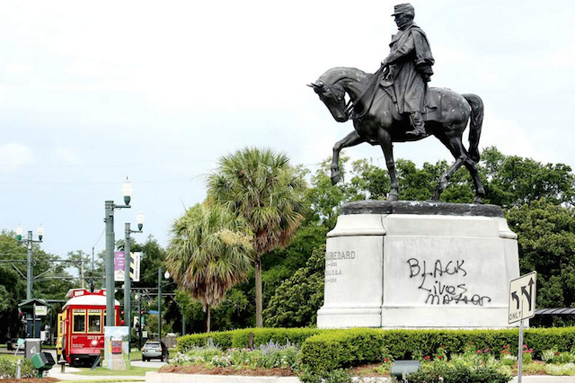 A statue of Confederate General P.G.T. Beauregard spray painted with the slogan "Black Lives Matter," New Orleans, Louisiana (photo by Eliot Kamenitz, via <a href="http://www.theneworleansadvocate.com/news/12774524-172/photos-statue-of-confederate-gen">New Orleans Advocate</a>)