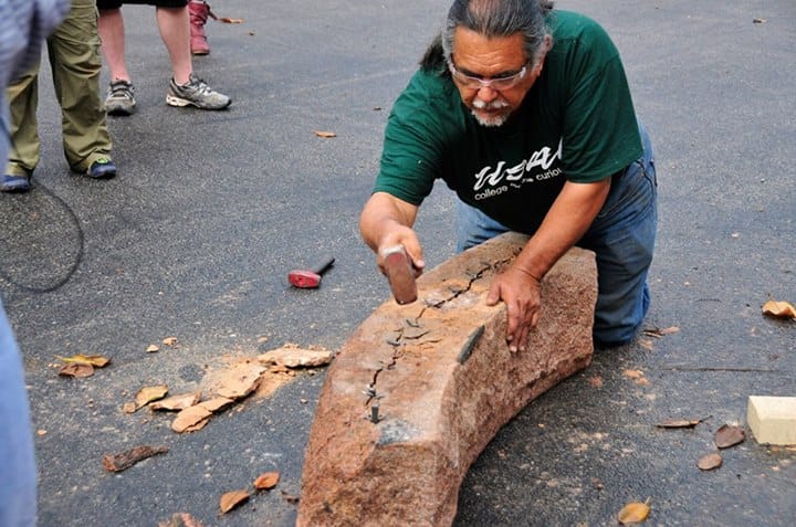 Jesús Moroles splitting granite for Coming Together Park at USAO
