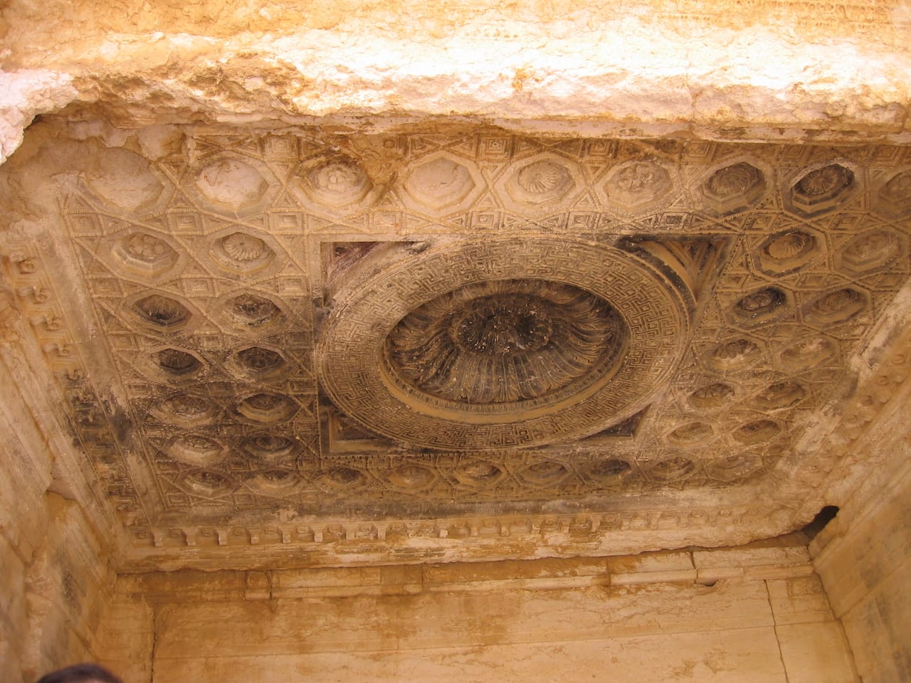 A decorated ceiling above the temple's altar, from a photograph taken in 2005 (photo via Wikipedia)