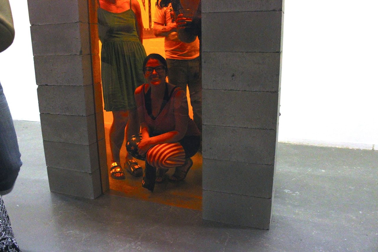 Corrie Baldauf, seen through her "Optimism Filter" installation