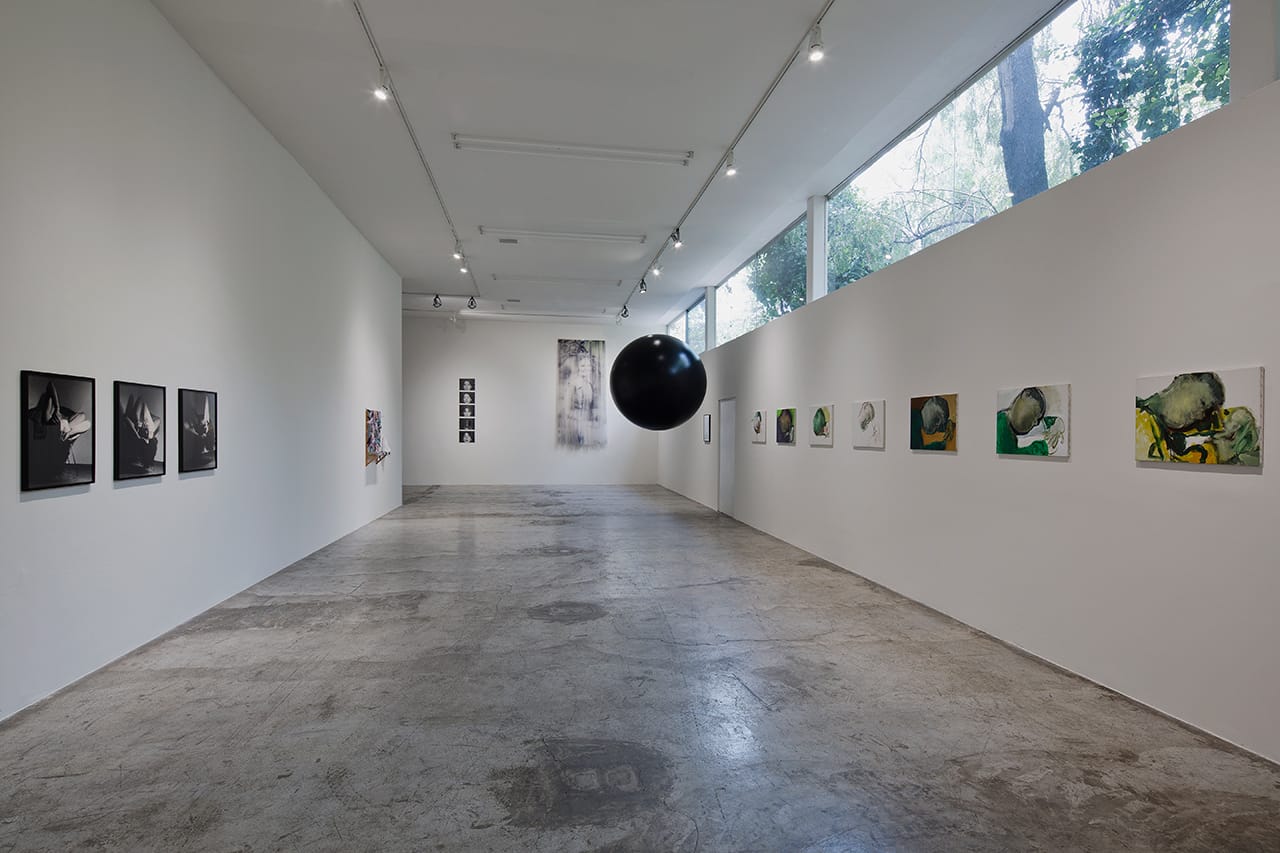 Installation view, 'Til I Get It Right' at LABOR gallery, with Edith Dekyndt's "Ground Control" (2008) in the center (photo by Ramiro Chaves, image courtesy the artists and LABOR, México City)