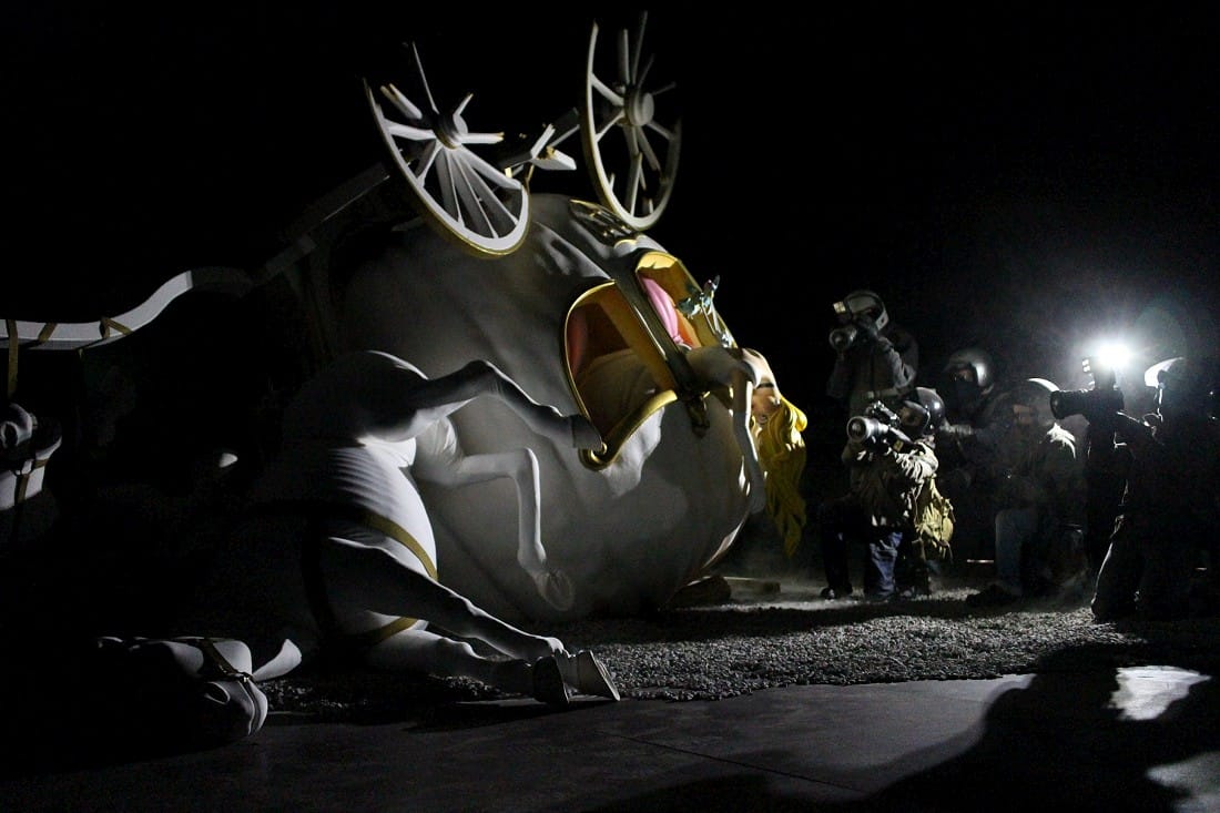 At the heart of Dismaland, inside the decaying castle, visitors rubberneck at Cinderella's overturned carriage (photo by @sashabogojev)