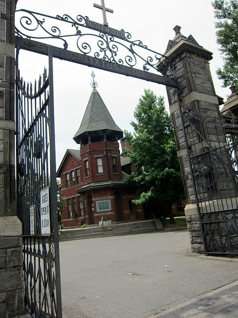 The gate to Calvary Cemetery in Queens, one of the sites on the LPC backlog