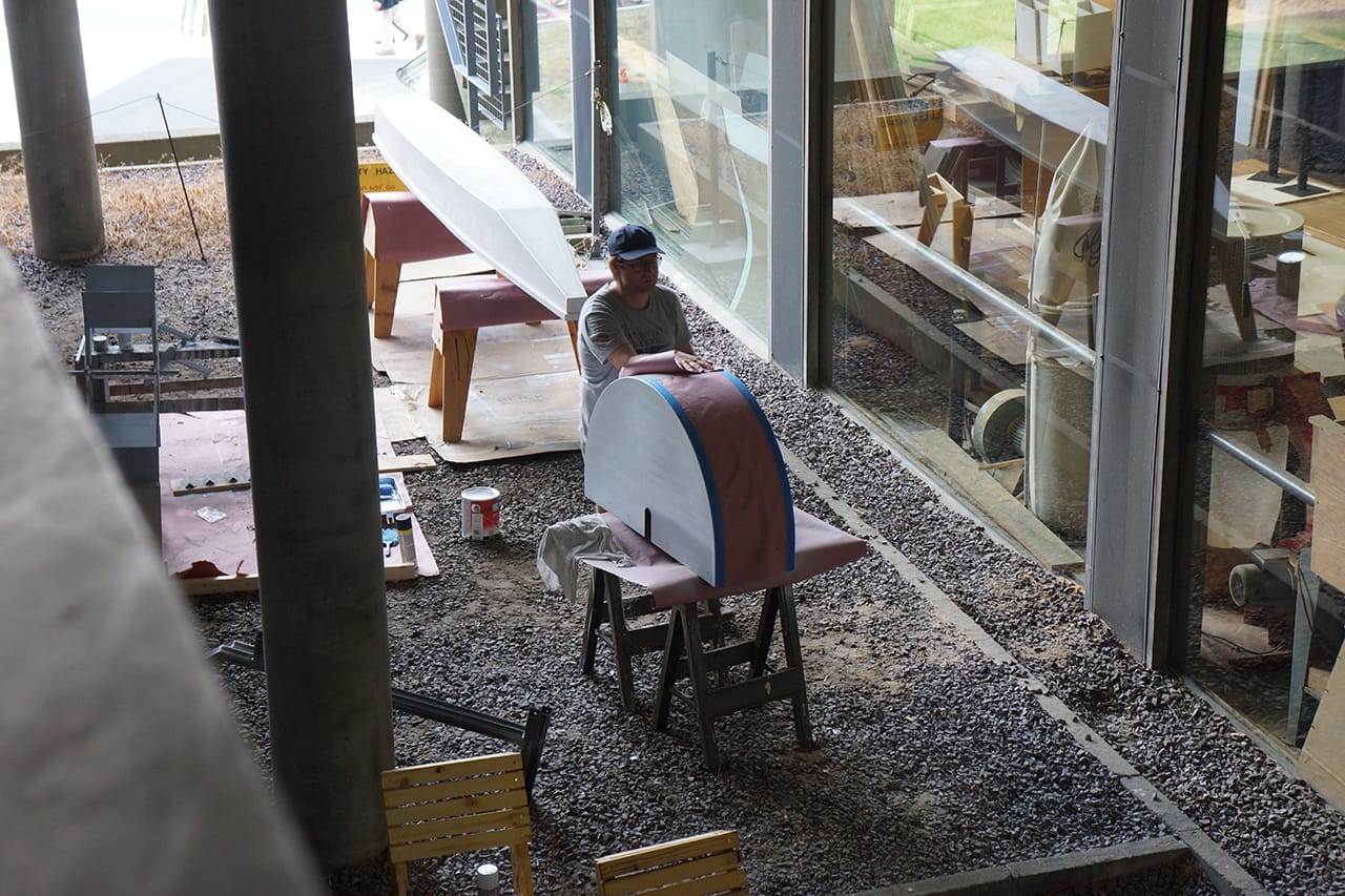 Working on a boat at the Carpenter Center