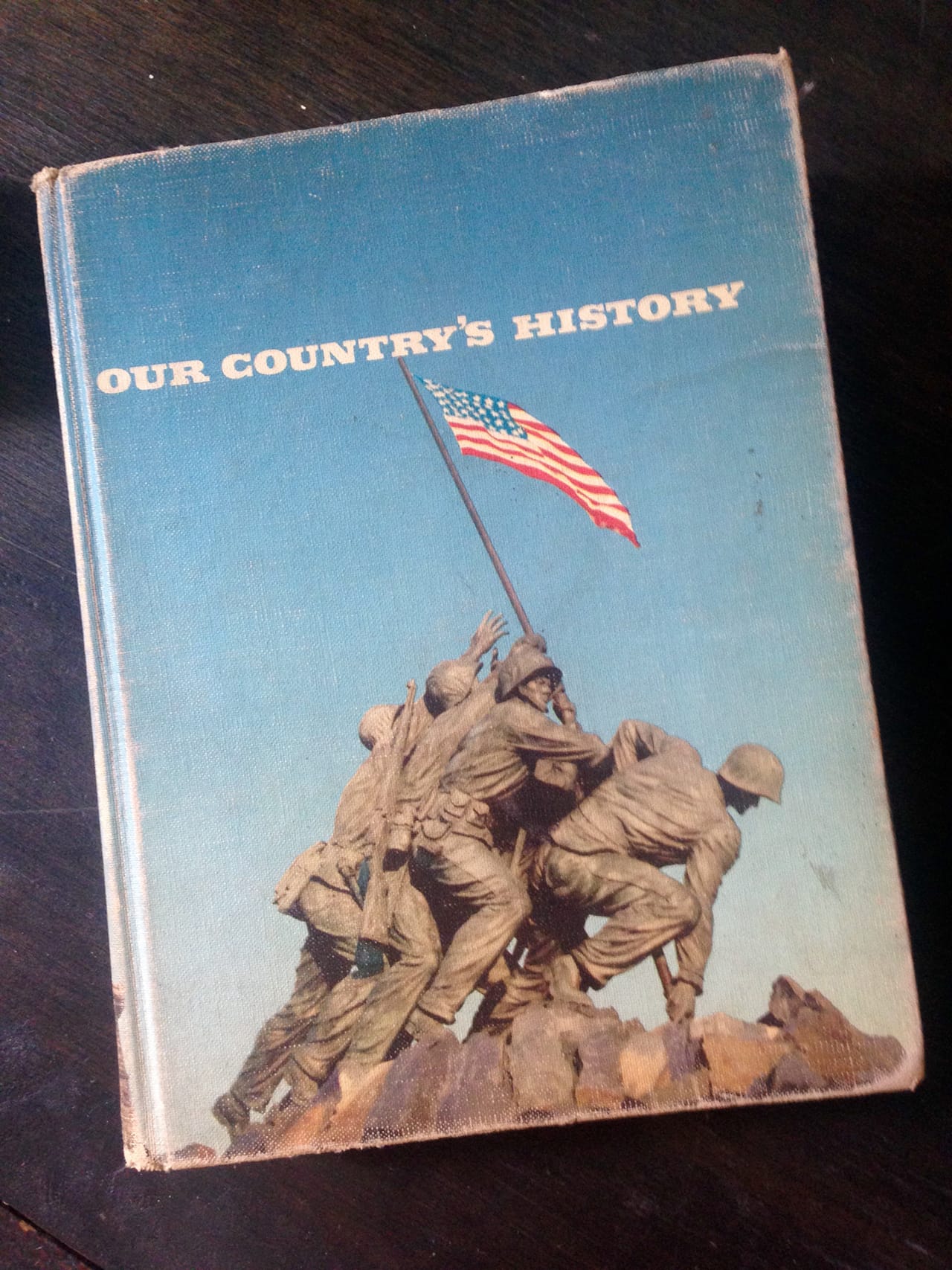 One of the many books in Elsewhere's collection