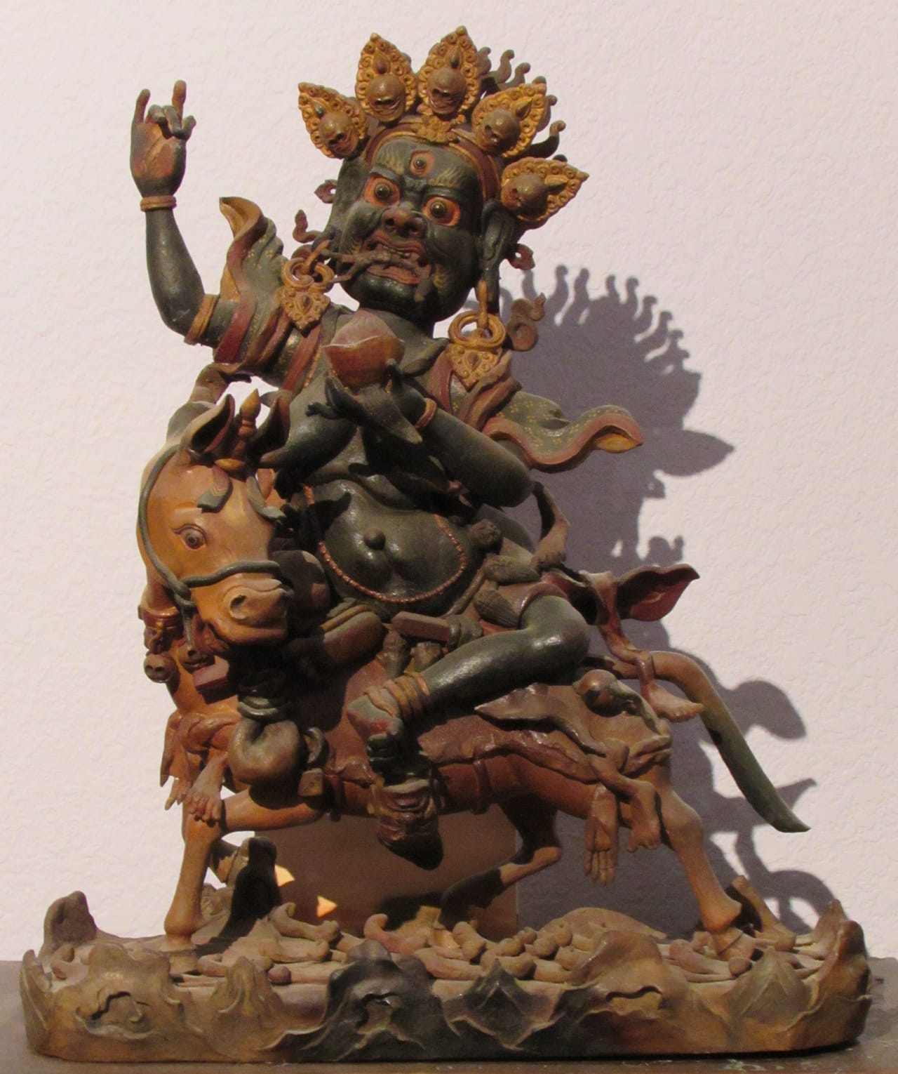 Likely the rarest work in the collection is this sculpture of Mongolian Palden Lhamo (18th century), incense paste and pigments, h: 18 in, gift of David Kamansky and Gerald Wheaton. (photo courtesy of the Kruizenga Art Museum)