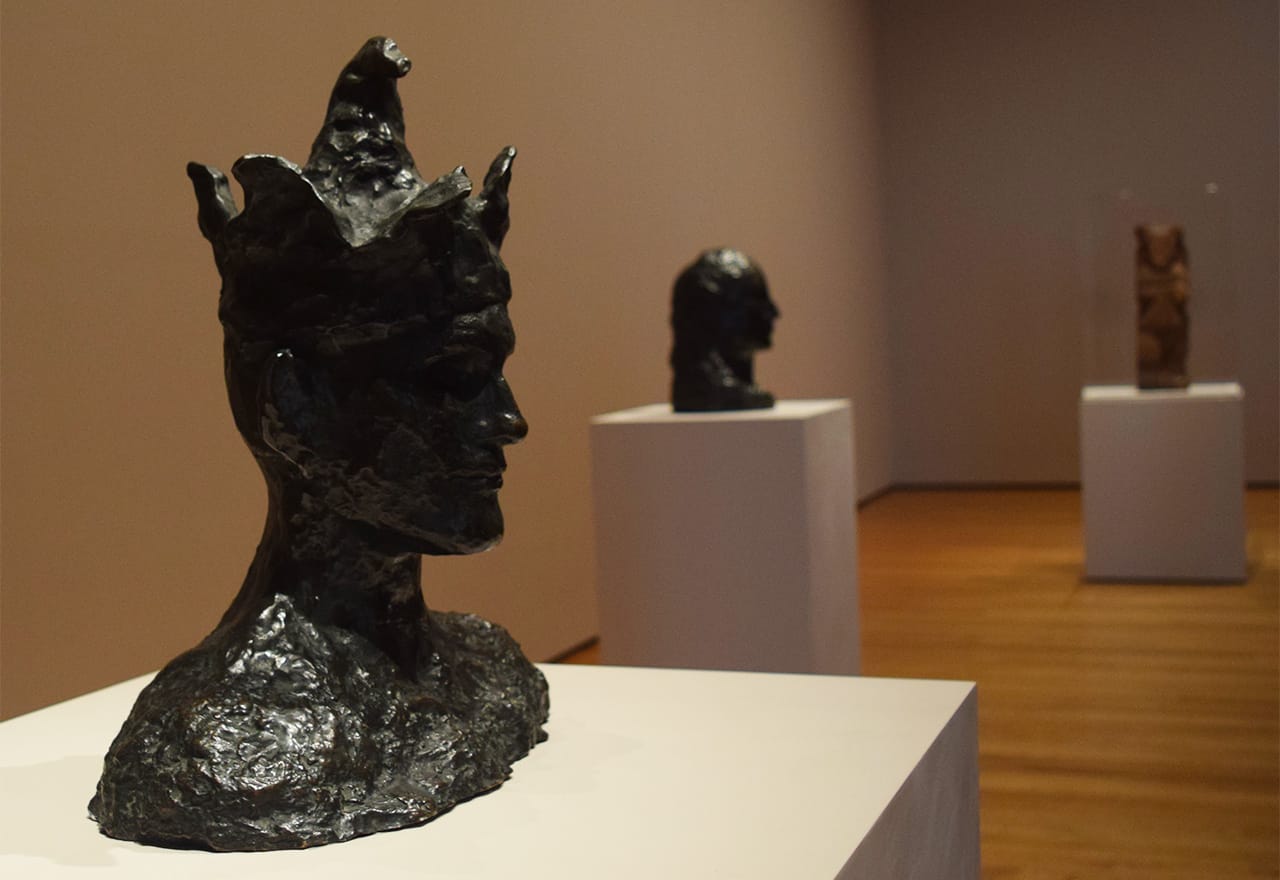 Installation view of 'Picasso Sculpture' at the Museum of Modern Art with Pablo Picasso's "The Jester" (1905)