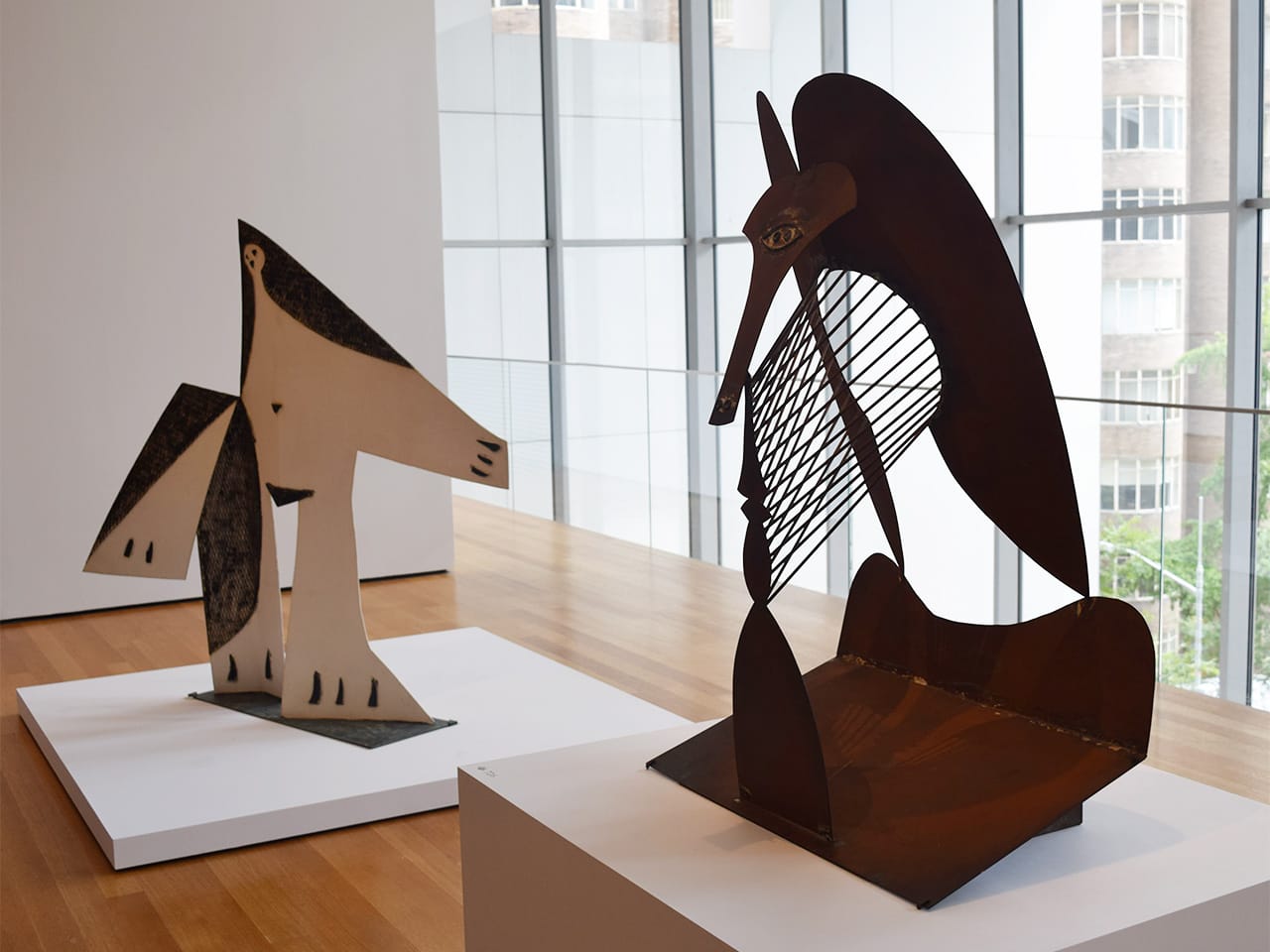Installation view of 'Picasso Sculpture' at the Museum of Modern Art with Pablo Picasso's "Woman with Outstretched Arms" (1961) at left and the exhibition's latest work, "Maquette for Richard J. Daley Center Sculpture" (1964), at right