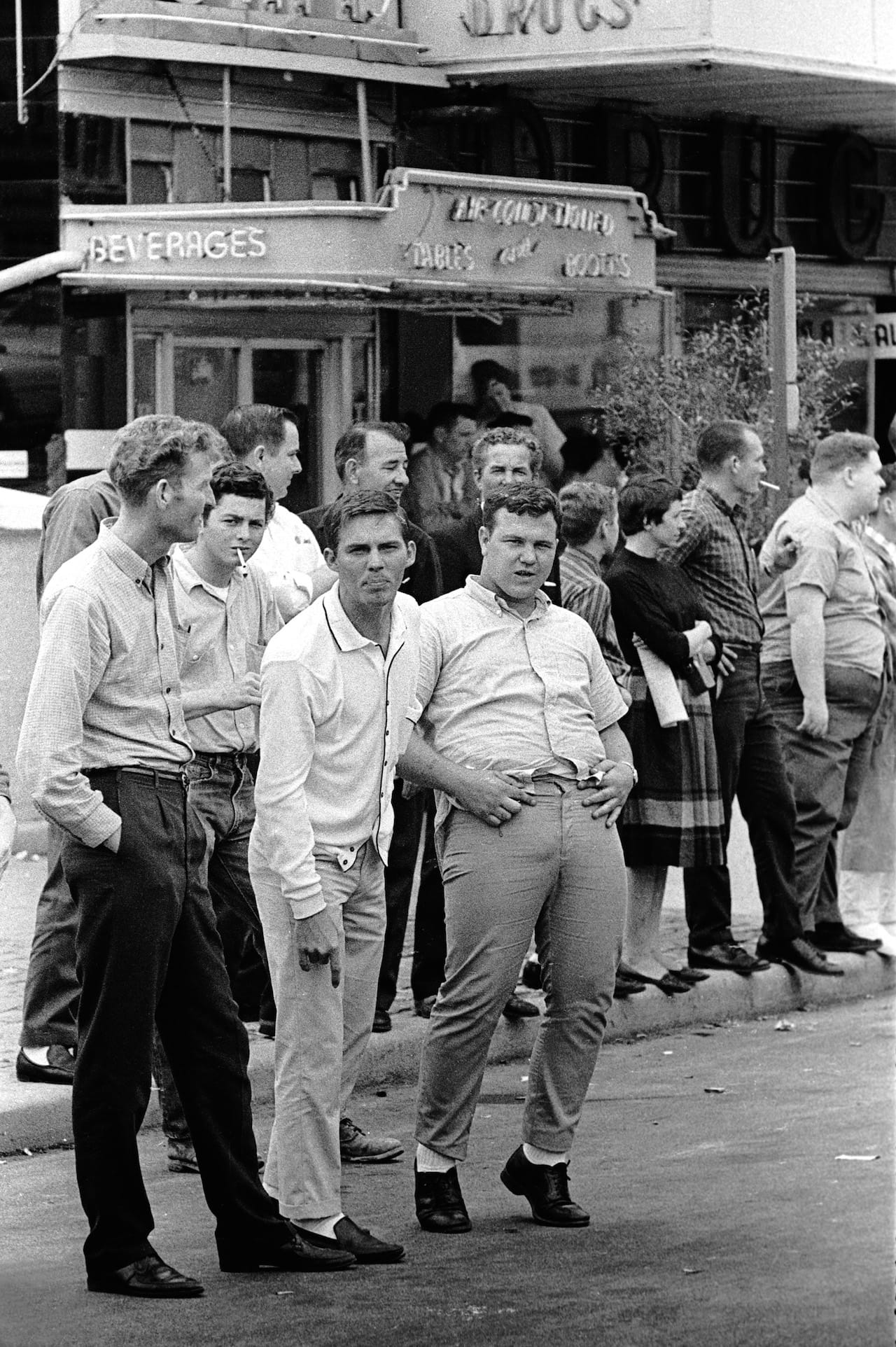 Stephen Somerstein, Hecklers yelling and gesturing at marchers, 1965. Courtesy of the photographer