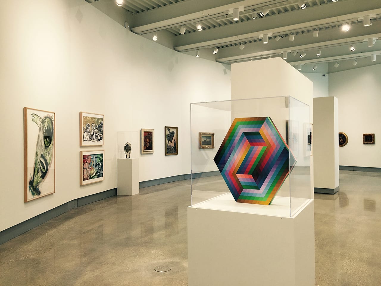 South gallery with editioned works by Victor Vasarely, foreground, and Susan Rothenberg, at far left