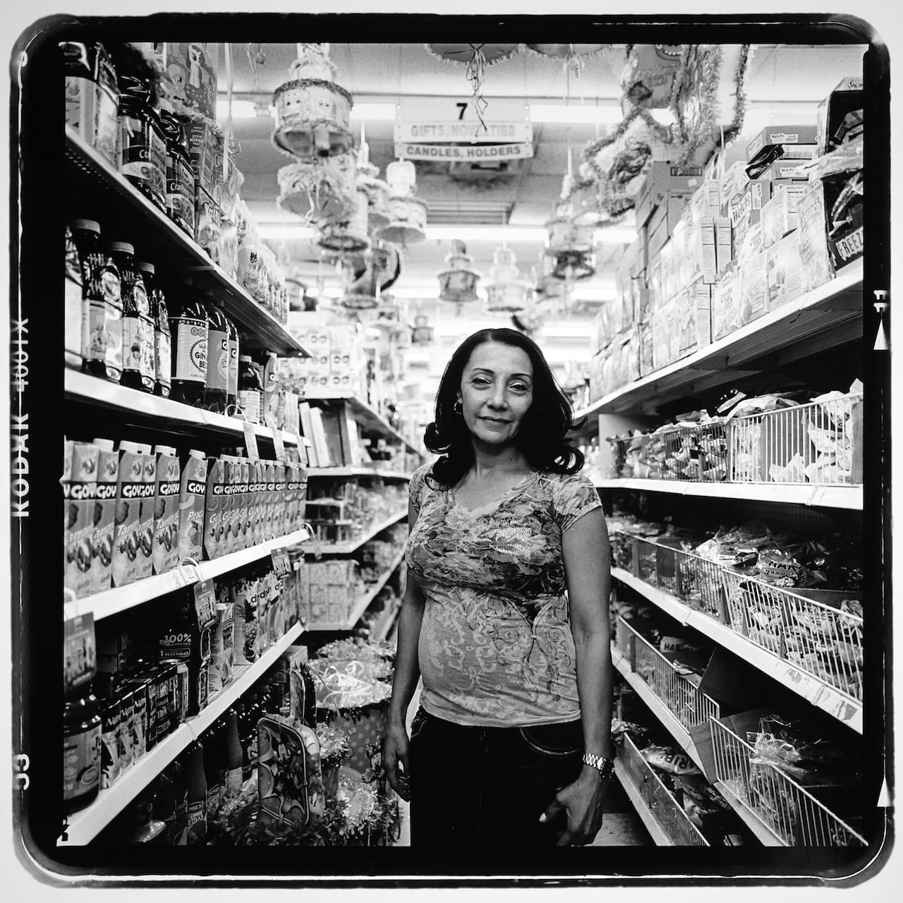 Isabel Kahlife came to the Bronx 24 years ago from Ponce, Puerto Rico in search of a better economic future. She has worked at the 99 Cents USA store, located at 1370 Jerome Avenue, as a cashier for the last two years. Ms. Kahlife worries the possible city rezoning of Jerome Avenue will adversely affect the residents of the area who shop at her store on a daily basis. Photo by Rhynna Santos/Bronx Photo League.