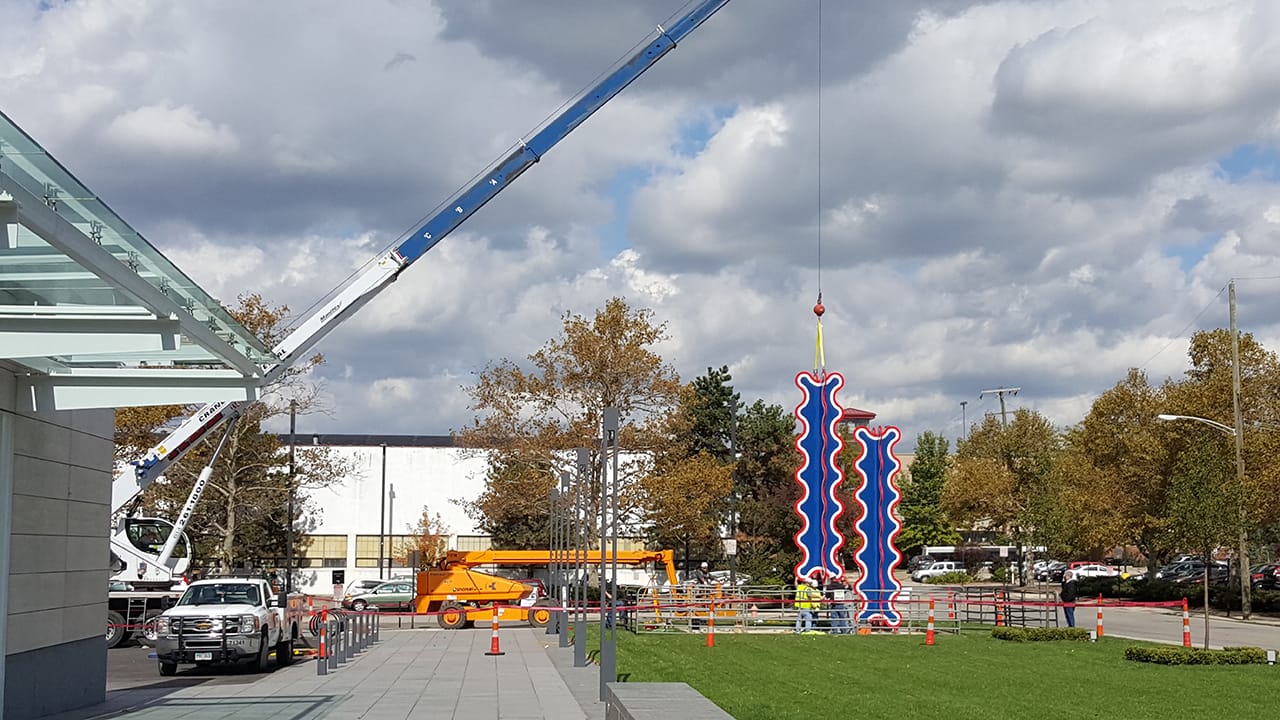 Paul Feely's "Karnak" being installed outside the museum