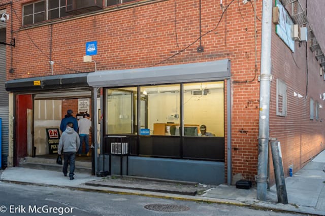 Workers at the B&H warehouse facility in Bushwick entering the workplace this morning (photo by Erik McGregor)
