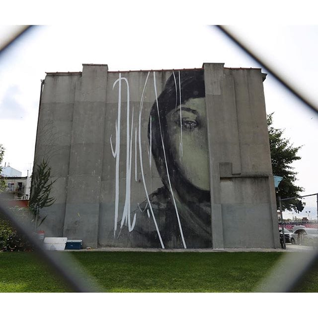 A mural by Faith47 in Red Hook, Brooklyn (photo by @dustyrebel/Instagram)