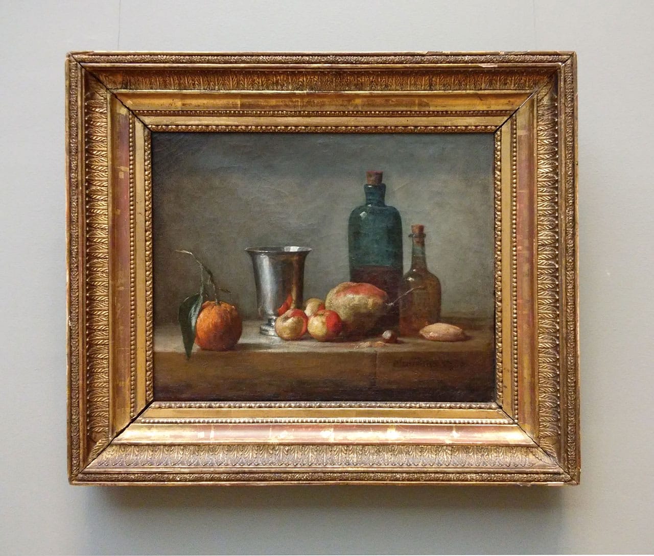 Jean-Baptiste-Siméon Chardin, “Seville Orange, Silver Goblet, Apples, Pear and Two Bottles” (1750), oil on canvas, 14.96 x 18.11 in (all photos by the author for Hyperallergic)