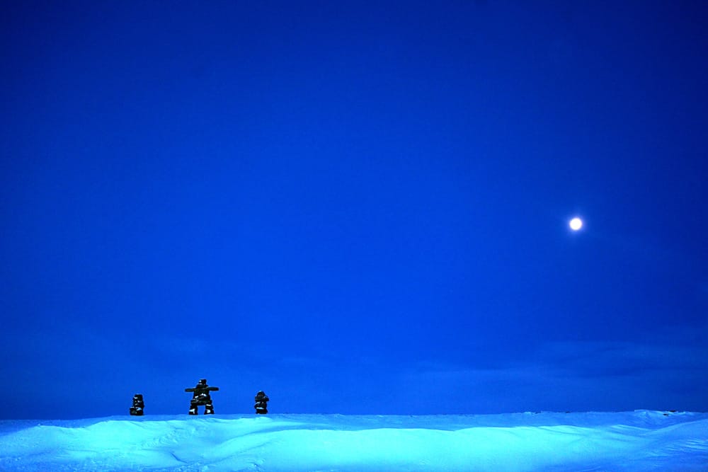 View of inukshuks (stone cairns) in Igloolik, Nunavut, in Arctic Canada (photo by Michele McDonald)