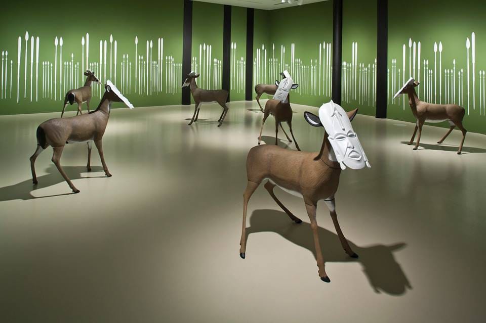 Brendan Fernandes, "Neo Primitivism 2" (2007-14), installation with plastic masks, deer decoys, and vinyl spears (via facebook)