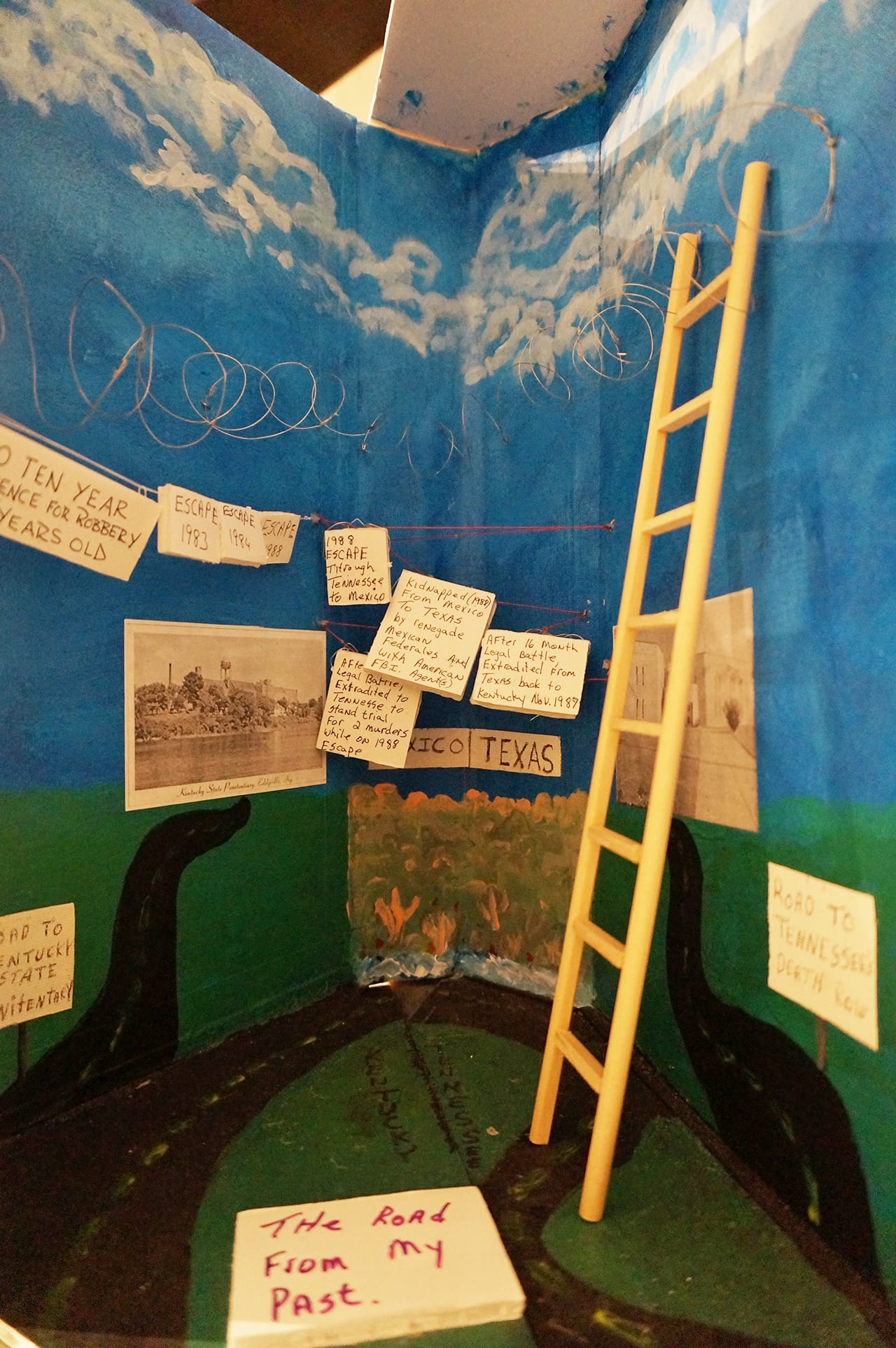 A cutout in the back of Derrick Quintero's "If My Journey Were a Book Title" (2012) (click to enlarge)