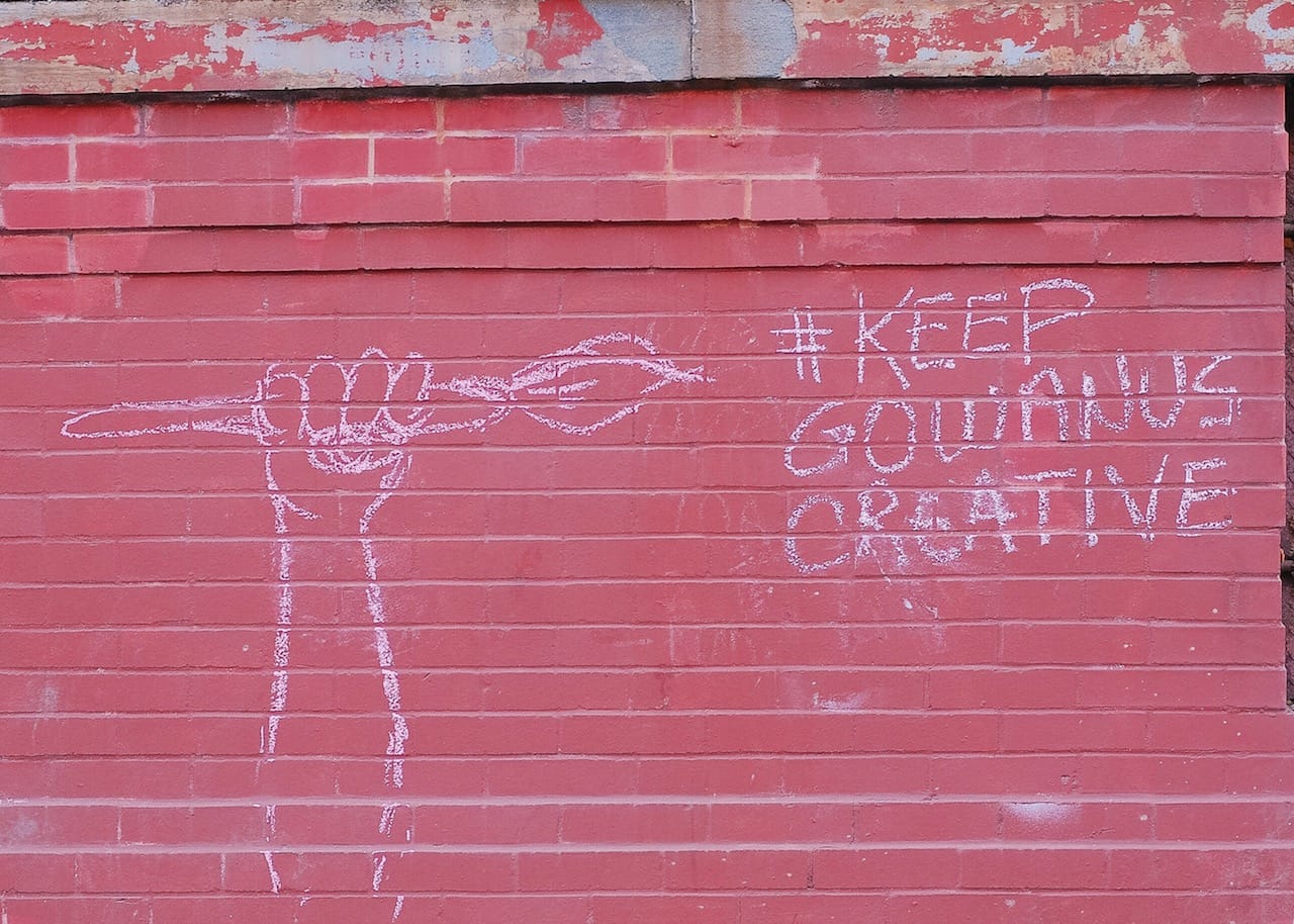 A chalk mural on the exterior of 94 9th Street (all photos by Erika Sequeira for Hyperallergic)