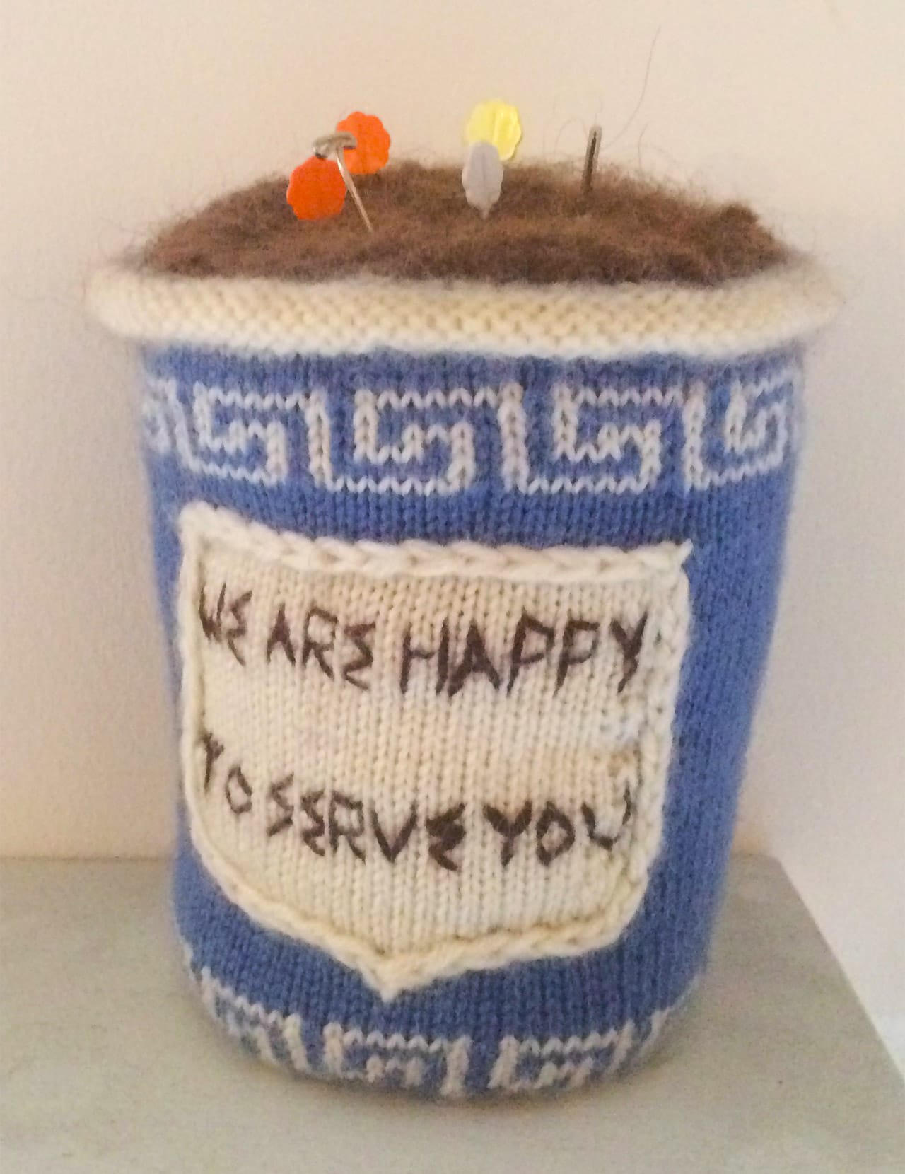 Juliet Hone, "Knitted NY Coffee Cup" at the Textile Arts Center