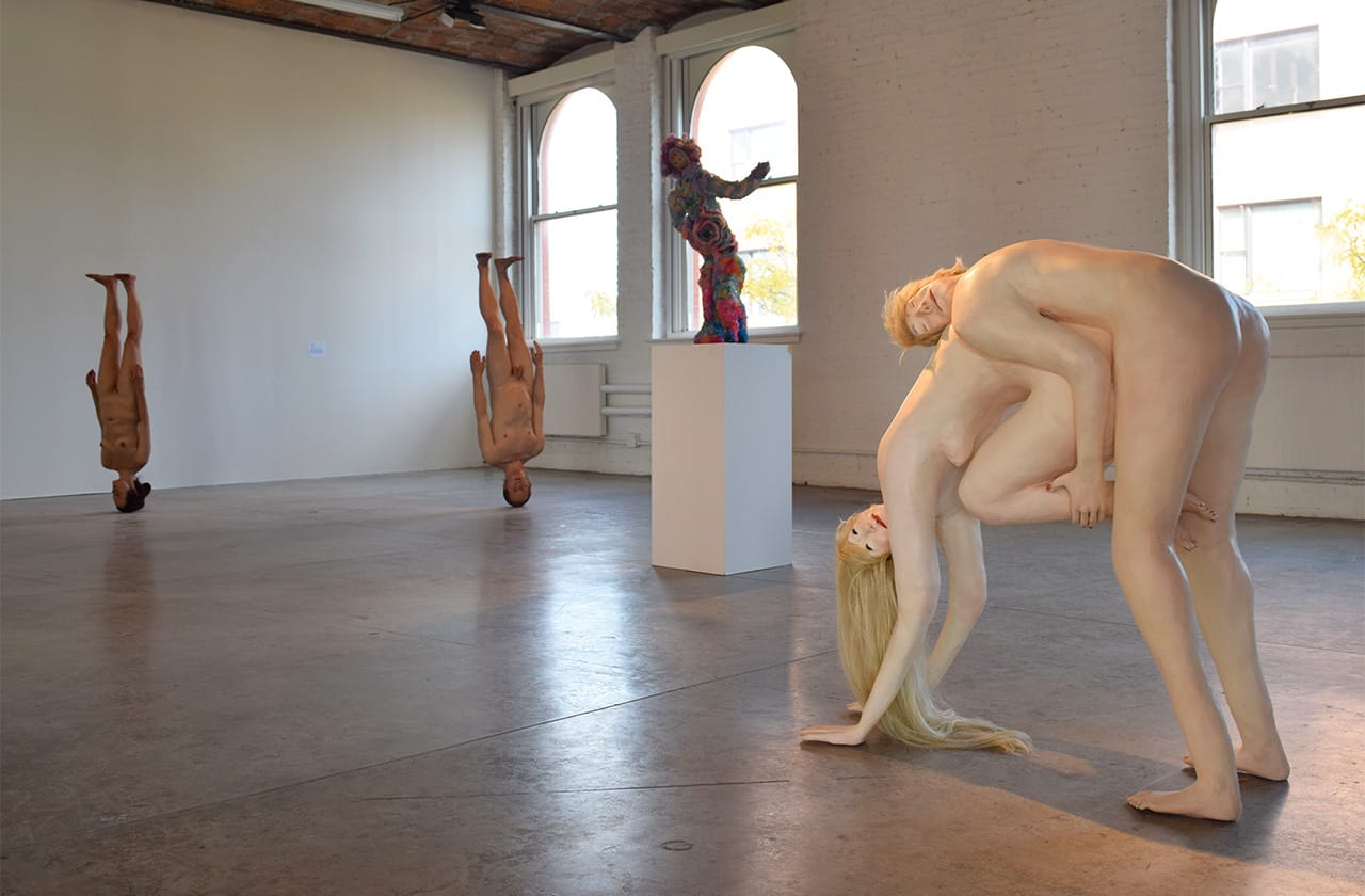 A large gallery devoted entirely to large figurative sculptures, including Elizabeth Jaeger's "Maybe We Die So the Love Doesn't Have to" (2015, right)