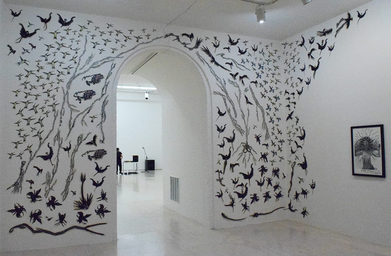 Collage installation by Mary Beth Edelson