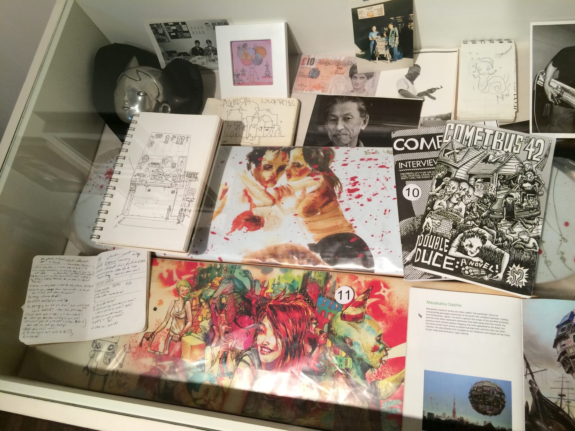 Display of zines, sketches, and photographs at Giant Robot Biennale 4, Japanese American National Museum