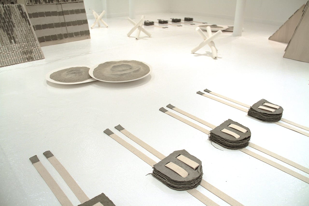 Liliya Lifanova, "Untitled (stacks with straps)" (2015), canvas, cement, acrylic, 30.5 x 5 x 2 in; "Untitled (2 piles)" (2015), ceramic, cement, aluminum, acrylic medium, 22 x 24 x 2.5 in; "Untitled (rolled, canvas, cement 02)" (2015), canvas, cement, acrylic medium, 19.25 x 23.5 x 34.25 in; "Untitled (cheval de frise)" (2015), ceramic, 9.25 x 9.25 x 9.25 in (click to enlarge)