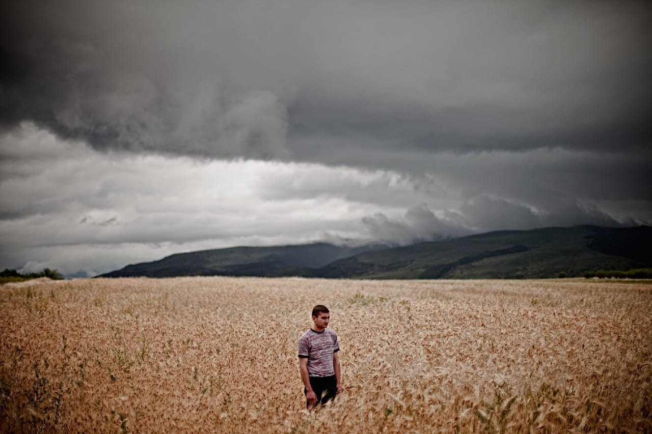 Karen Mirzoyan, "Artur Hagopyan, age 21, car mechanic. His father Artavazd died on this field on the road to Aghdam on June 12, 1993" from Karabagh War Series, Chapter 3: The Future (2010)