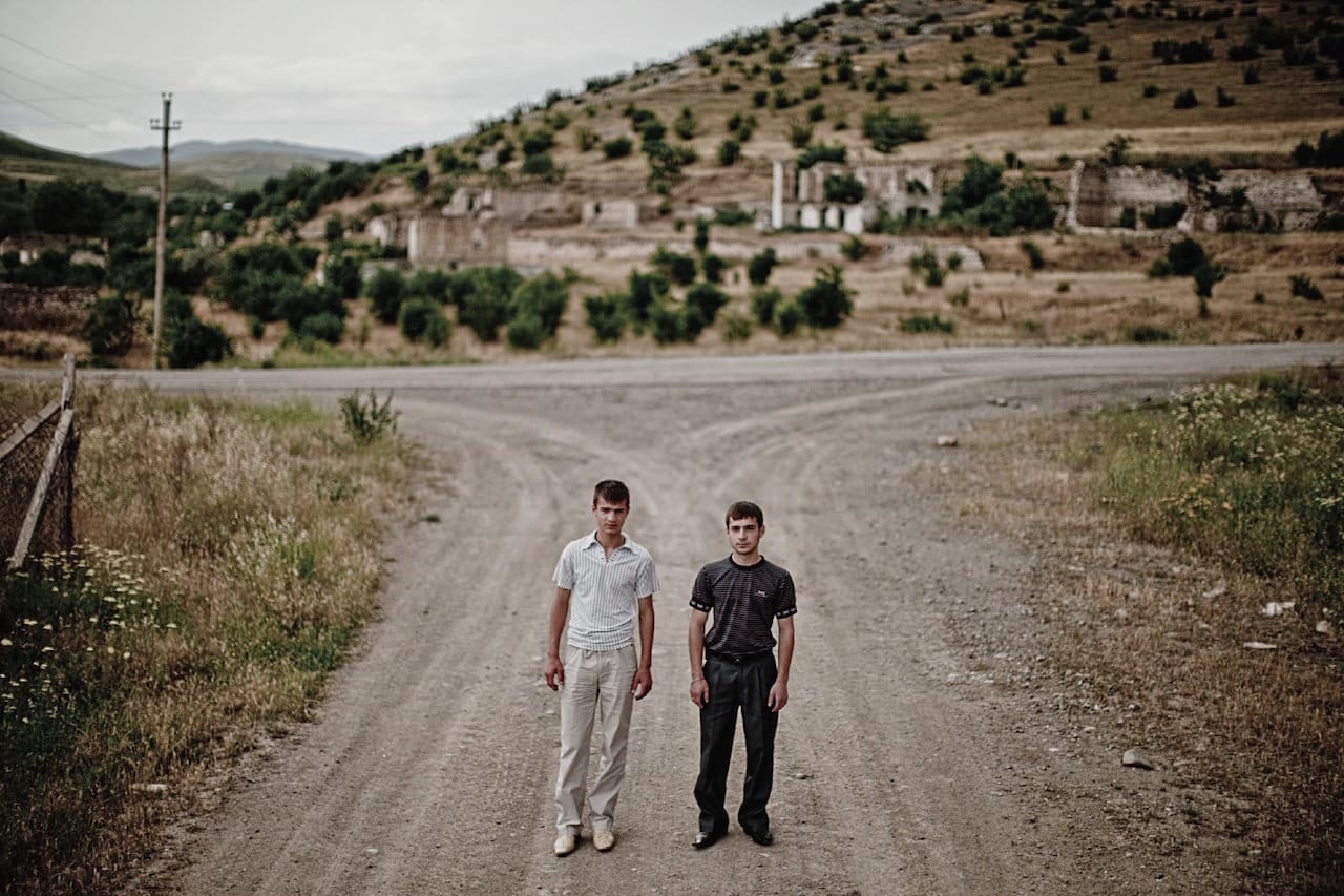Karen Mirzoyan, "Nikolai and Vahag Hayrapetyan, ages 18 and 17. Their father Garegin died at the age of 31 on this crossroad in Nor Karmiravan, Mardakert" from Karabagh War Series, Chapter 3: The Future (2010)