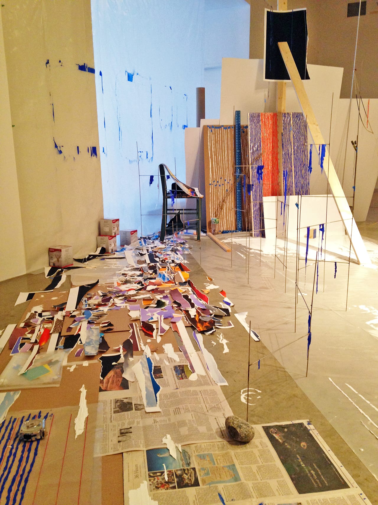 Sarah Sze, "Second Studio (Fragment Series)" (detail) (2015), acrylic paint, archival prints, stainless steel, wood, chair, metal chain, stone, plastic, plant, foamcore, newspaper, chipboard, 