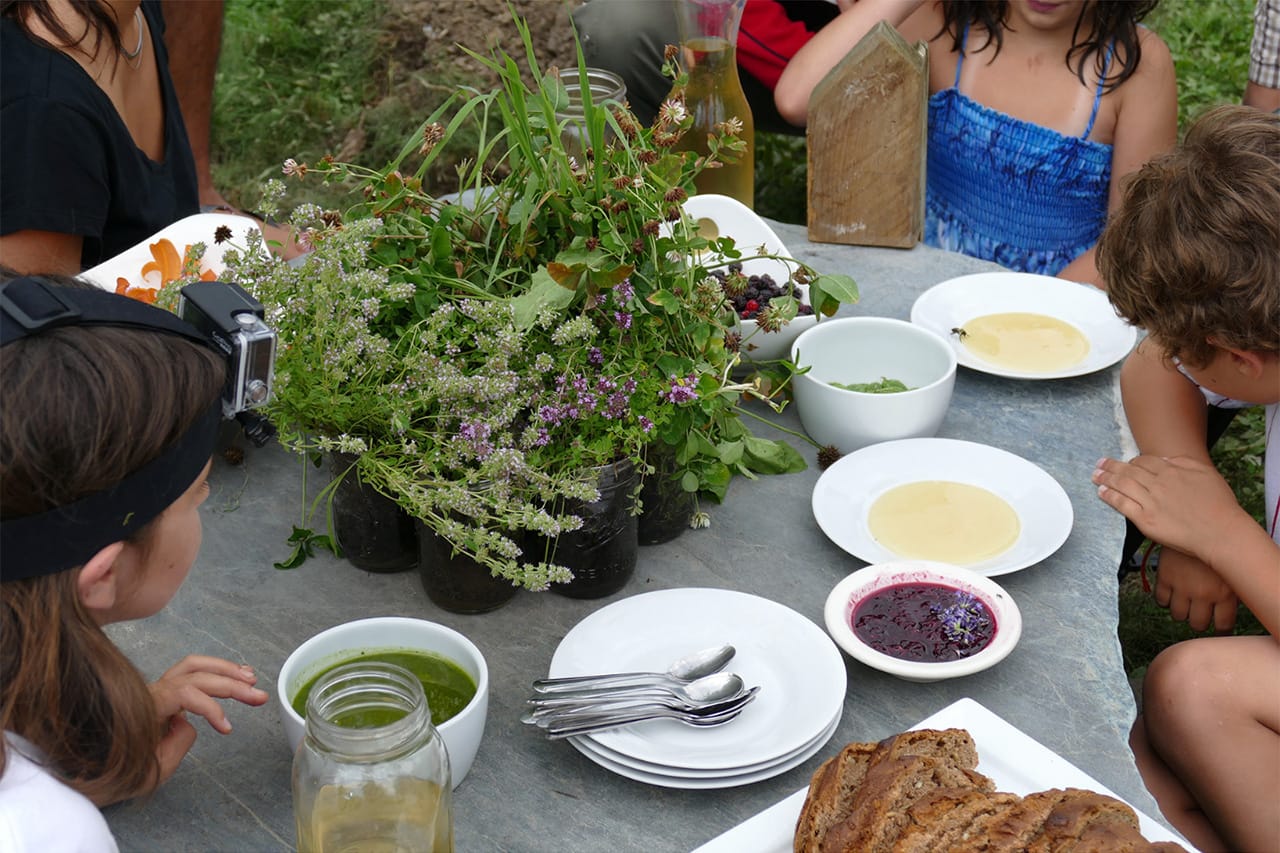 A bee "pulls up a seat" at the dinner at Marble House Project in Vermont. (all photos courtesy the artist)