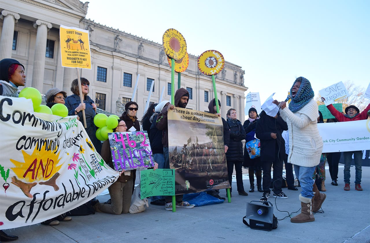 Alicia Boyd of Movement to Protect the People speaks to the protesters outside the Brooklyn Museum during the 2015 Brooklyn Real Estate Summit.