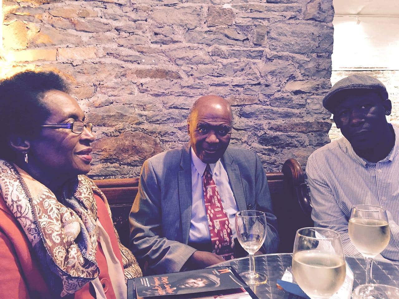 Dr Paul Stephenson, center, with his wife of 50 years, Joyce, and local author Roger Griffith, awaiting Gates's presentation at St George's (click to enlarge)