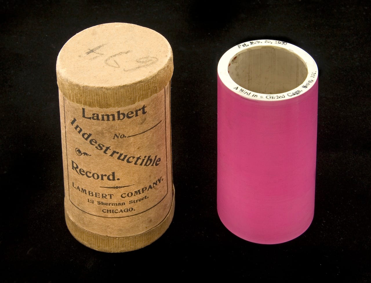 Lambert cylinder featuring "A bird in a gilded cage," possibly by Joe Natus (click to enlarge)
