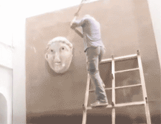 Members of ISIS destroying ancient statues in the Mosul Museum (GIFs Hrag Vartanian/Hyperallergic)