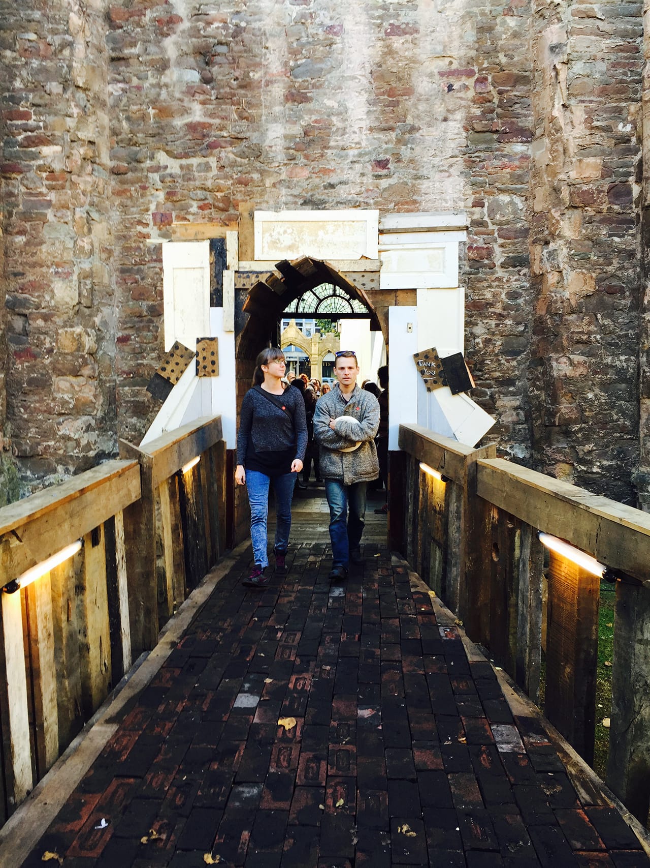 A path lined with bricks given by the Salvation Army leads visitors from the gate to the performance space.