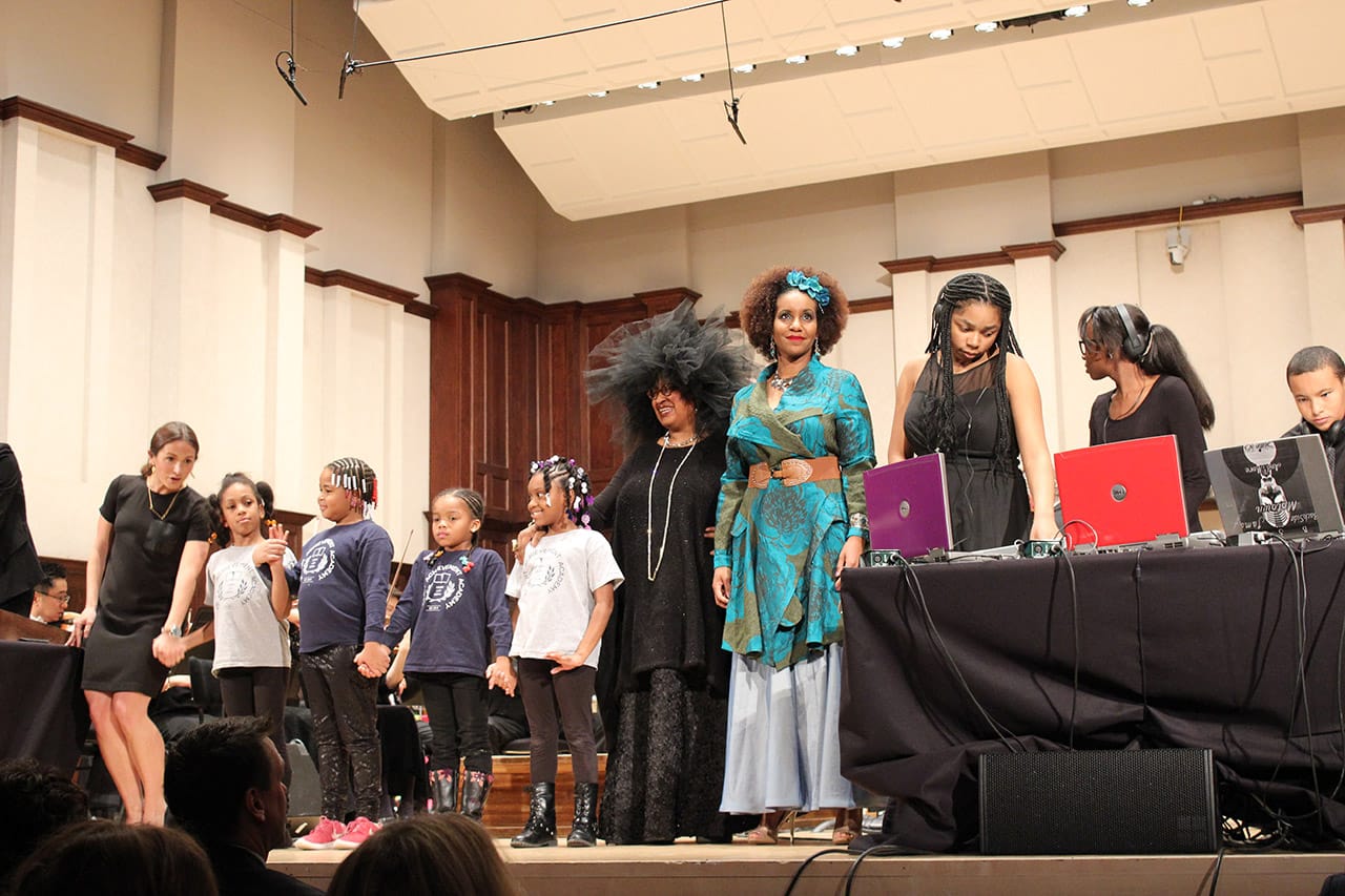 Onstage at 'Symphony in D,' from left to right: teacher and students from Detroit Achievement Academy, Marsha Music, Tonya Maria Matthews, students from YouthVille