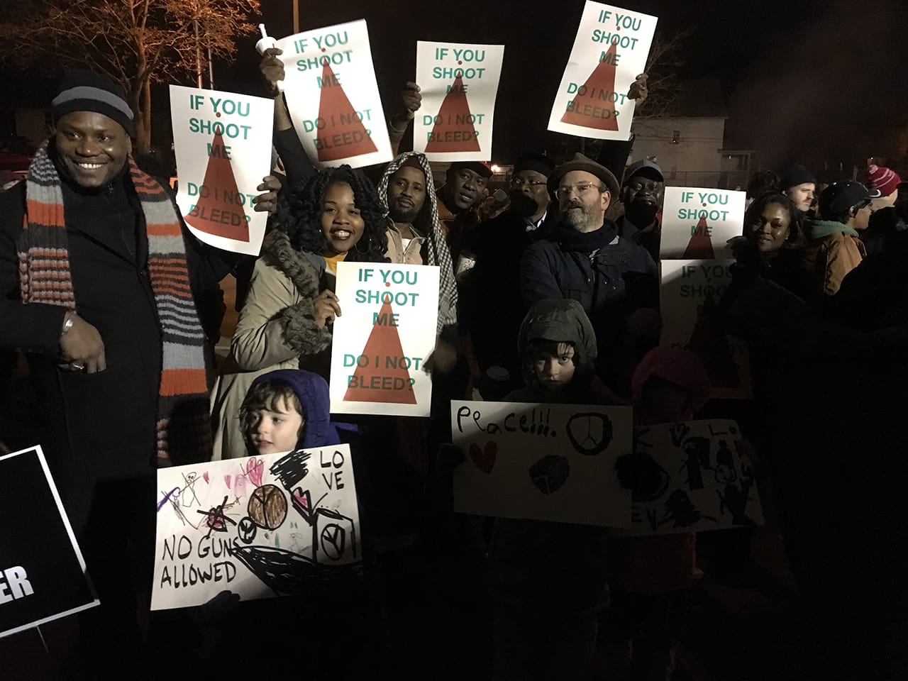 Sam Gould (with hat, at right) with demonstrators, including his children, at the Fourth Precinct encampment (photo by the author)