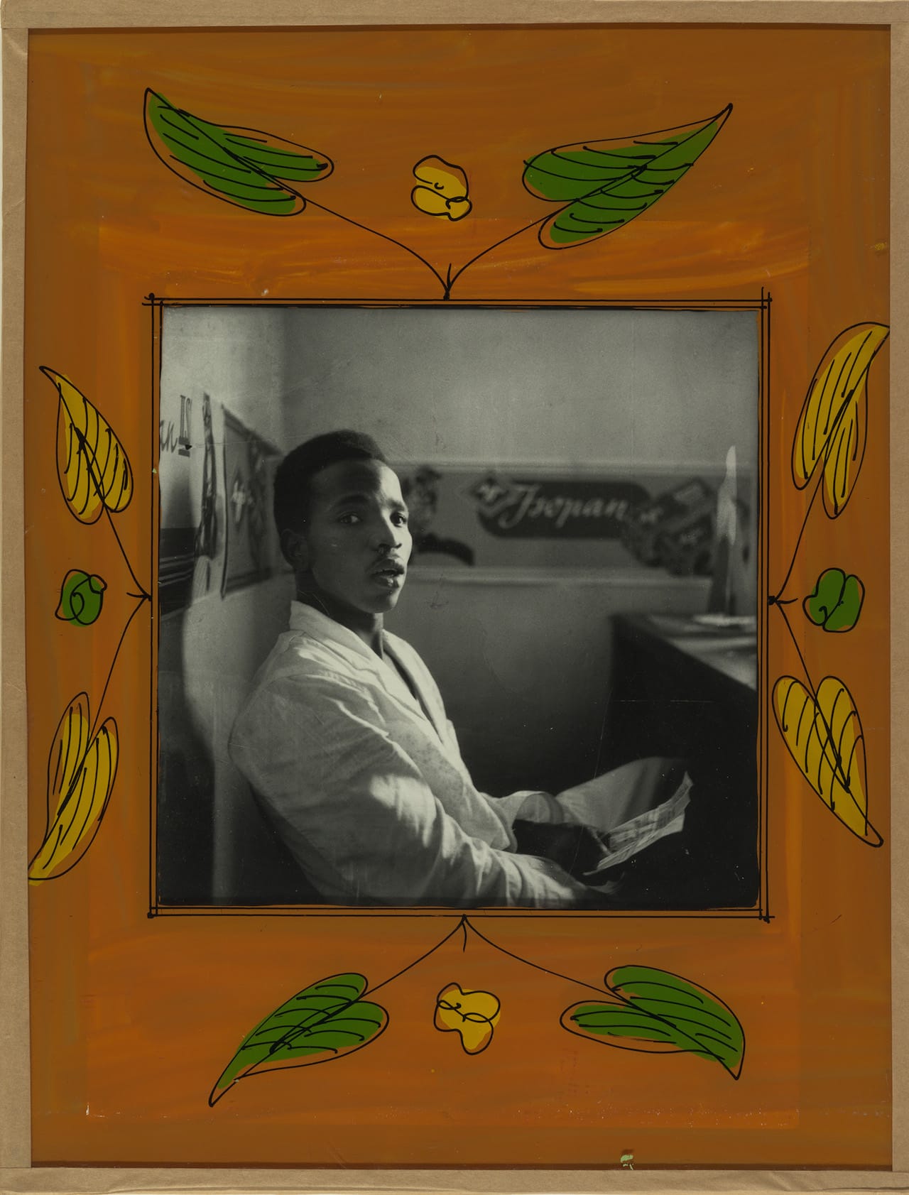 Malick Sidibé (Malian, b. 1936) Self-Portrait, 1956 Gelatin silver print in original frame of reverse-painted glass, tape, cardboard, string Gift of Jack Shainman and Claude Simard, 2014 (2014.638) 