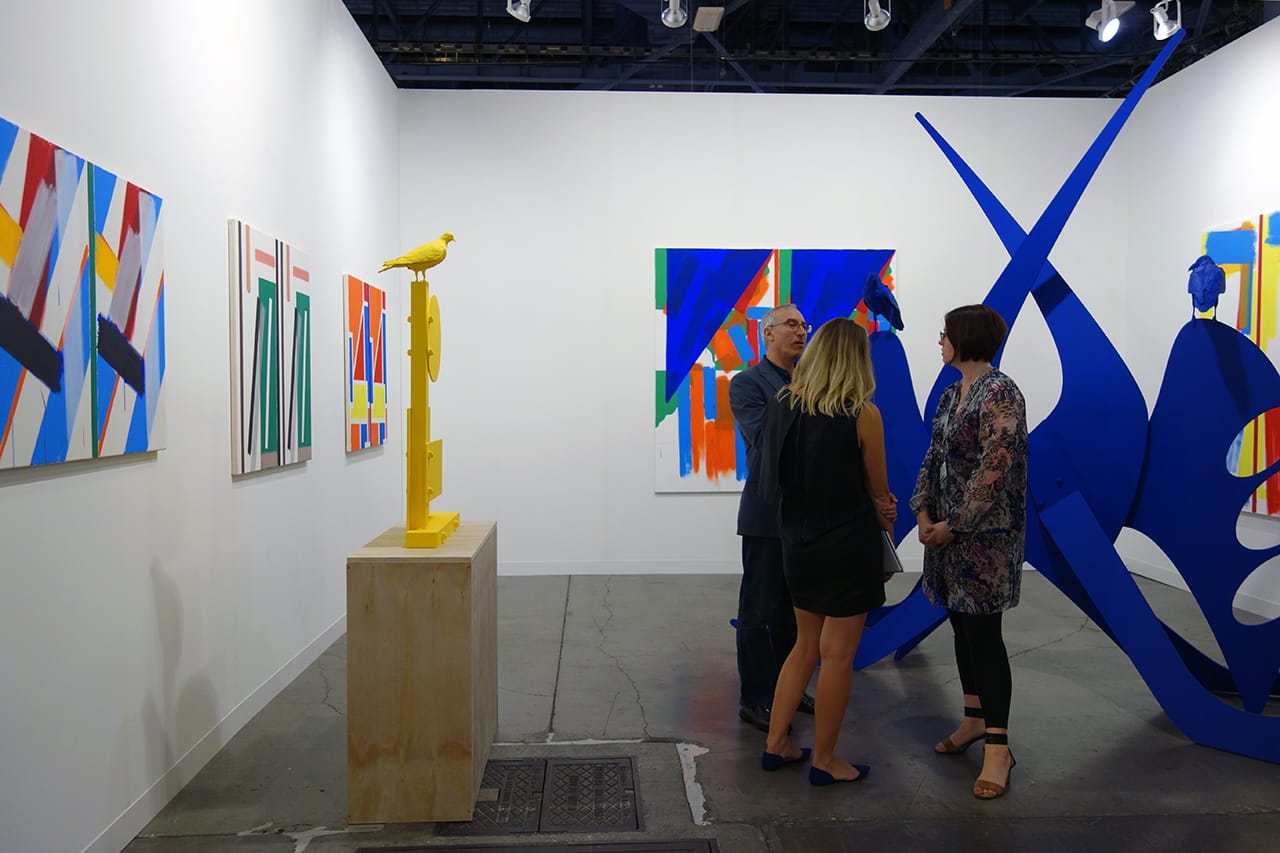 Installation view of art sculpture by Nathan Mabry and painting by Bernard Piffaretti with Cherry and Martin